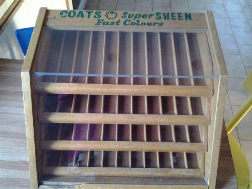 antique coats advertising haberdashery cabinet